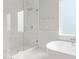 Modern bathroom with a freestanding tub, a luxurious walk-in shower, and elegant tile at 1228 N 106Th Pl, Mesa, AZ 85207