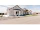 Stylish home exterior with a well-maintained yard and contemporary architectural design at 1228 N 106Th Pl, Mesa, AZ 85207