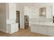 Modern kitchen with sleek countertops, stainless steel appliances, and ample cabinet space at 1228 N 106Th Pl, Mesa, AZ 85207