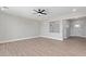 Bright, open living area with wood-look floors and neutral paint at 1228 N 106Th Pl, Mesa, AZ 85207