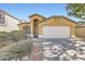 Charming single-Gathering home featuring a two-car garage and well-maintained front yard landscaping at 12333 W Marshall Ave, Litchfield Park, AZ 85340