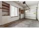 This garage features a sink, storage, and window for natural light to enhance the space at 13196 W Coronado Rd, Goodyear, AZ 85395