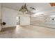 This spacious garage has pegboard walls and plenty of space for projects and vehicle parking at 13196 W Coronado Rd, Goodyear, AZ 85395