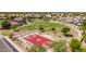 Community park featuring a basketball court, playground, and green space for recreational activities at 13196 W Coronado Rd, Goodyear, AZ 85395