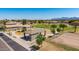 This park area features a playground, picnic tables, and paths at 13196 W Coronado Rd, Goodyear, AZ 85395