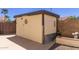 Outdoor shed with ample storage space, set within a fenced backyard, perfect for tools at 13196 W Coronado Rd, Goodyear, AZ 85395