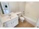 Bathroom boasts a single vanity, toilet, and shower-tub combination for functional space at 1360 E Washington Ave, Gilbert, AZ 85234