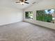 Spacious bedroom with vaulted ceilings and large windows offering abundant natural light at 1360 E Washington Ave, Gilbert, AZ 85234
