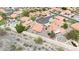 A residential neighborhood with desert landscaping, swimming pools, and tile roofs in a close proximity at 15437 S 23Rd Pl, Phoenix, AZ 85048