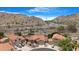 Picturesque aerial view of a vibrant community nestled among stunning desert mountain scenery at 15437 S 23Rd Pl, Phoenix, AZ 85048