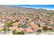 Picturesque aerial perspective of a community set against the backdrop of scenic mountains and blue sky at 15437 S 23Rd Pl, Phoenix, AZ 85048