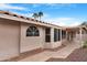 Inviting backyard featuring well-kept landscaping and a covered patio area at 15437 S 23Rd Pl, Phoenix, AZ 85048