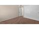 Neutral bedroom featuring carpeted floors and a closet with sliding doors at 15437 S 23Rd Pl, Phoenix, AZ 85048