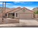 Charming single-story home featuring desert landscaping, and a two-car garage at 15437 S 23Rd Pl, Phoenix, AZ 85048
