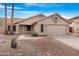 Charming single-story home featuring desert landscaping, and a two-car garage at 15437 S 23Rd Pl, Phoenix, AZ 85048