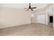 Spacious living room showcasing tile floors and a ceiling fan at 15437 S 23Rd Pl, Phoenix, AZ 85048