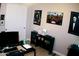 Office features a desk, shelves and personal items at 15620 W Cameron Dr, Surprise, AZ 85379