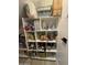 A large organized pantry featuring white shelving and abundant storage space at 15620 W Cameron Dr, Surprise, AZ 85379