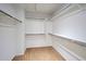 Walk-in closet featuring carpet floors and shelving at 15834 W Avalon Dr, Goodyear, AZ 85395