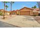 Beautiful house with desert landscaping, a 2-car garage, and a concrete driveway at 15834 W Avalon Dr, Goodyear, AZ 85395