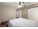 Bedroom with wood floor and closet at 16187 W Gibson Ln, Goodyear, AZ 85338