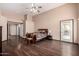 Spacious main bedroom has wood floors and an exterior door at 16187 W Gibson Ln, Goodyear, AZ 85338