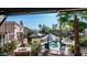 Picturesque backyard with a sparkling pool, surrounded by tropical landscaping and patio furniture at 1620 W Nighthawk Way, Phoenix, AZ 85045