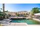 Inviting backyard featuring a pool, spa, desert landscaping, and a block wall at 1620 W Nighthawk Way, Phoenix, AZ 85045