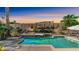 Inviting backyard featuring a pool, spa, desert landscaping, and a block wall at 1620 W Nighthawk Way, Phoenix, AZ 85045