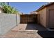 Private backyard featuring block wall and brick-paved area at 1624 E Marigold St, Casa Grande, AZ 85122