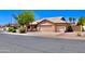 Well maintained home with a three-car garage, tile roof, and low maintenance landscaping at 1624 E Marigold St, Casa Grande, AZ 85122
