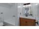 Bathroom featuring a modern vanity and a shower/tub at 16602 N 25Th St # 112, Phoenix, AZ 85032