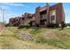 Attractive condominium building with a red brick exterior, walkways and lovely landscaped grounds at 16602 N 25Th St # 112, Phoenix, AZ 85032