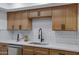 Bright kitchen featuring sleek countertops, stylish cabinets, and modern stainless steel appliances at 16602 N 25Th St # 112, Phoenix, AZ 85032