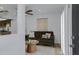 Comfortable living room with a modern sofa, wood table, stylish rug and light-filled space at 16602 N 25Th St # 112, Phoenix, AZ 85032
