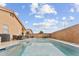 The backyard features a pool and privacy walls at 16823 S 8Th St, Phoenix, AZ 85048