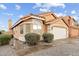 Inviting single-story home showcasing a terra cotta tile roof and a two-car garage at 16823 S 8Th St, Phoenix, AZ 85048