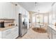 Bright kitchen featuring stainless steel refrigerator and a cozy breakfast nook with natural lighting at 16823 S 8Th St, Phoenix, AZ 85048