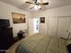 Bedroom with a bed and view into the bathroom at 172 S Agua Fria Ln, Casa Grande, AZ 85194
