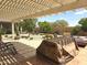 Relaxing outdoor patio with seating area and desert landscaping at 172 S Agua Fria Ln, Casa Grande, AZ 85194