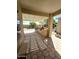 Covered patio area with built-in grill and seating at 172 S Agua Fria Ln, Casa Grande, AZ 85194