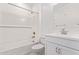 Neat bathroom featuring a tub with shower and a single sink vanity with modern finishes at 18508 E Dario Rd, Gold Canyon, AZ 85118