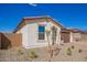 Attractive home showcasing desert landscaping, paver driveway, and tile roof at 18508 E Dario Rd, Gold Canyon, AZ 85118