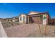 Charming single-story home with desert landscaping and paver driveway at 18508 E Dario Rd, Gold Canyon, AZ 85118