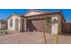 Home features a two-car garage, tile roof, and desert landscaping at 18508 E Dario Rd, Gold Canyon, AZ 85118