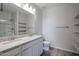 Modern bathroom showcasing a double vanity with granite countertops and a shower at 19360 N Diego Way, Maricopa, AZ 85138