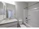 Bathroom featuring a shower-tub combo and a granite countertop vanity at 19360 N Diego Way, Maricopa, AZ 85138