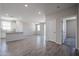 Open-concept living space featuring tile floors, recessed lighting, and a kitchen island at 19360 N Diego Way, Maricopa, AZ 85138