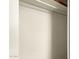 Inside a closet with a wood shelving unit at 2019 W Wayland Rd, Phoenix, AZ 85041