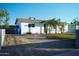 The exterior shows a well-maintained home, featuring a drive way and a newly landscaped yard at 2019 W Wayland Rd, Phoenix, AZ 85041